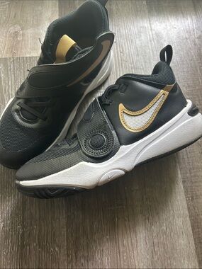 Nike Kids Black and Gold Slip On Sneakers